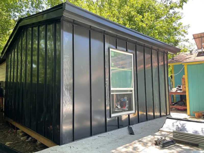 Black standing seam metal wall panels for Roof Inspection in Lapeer