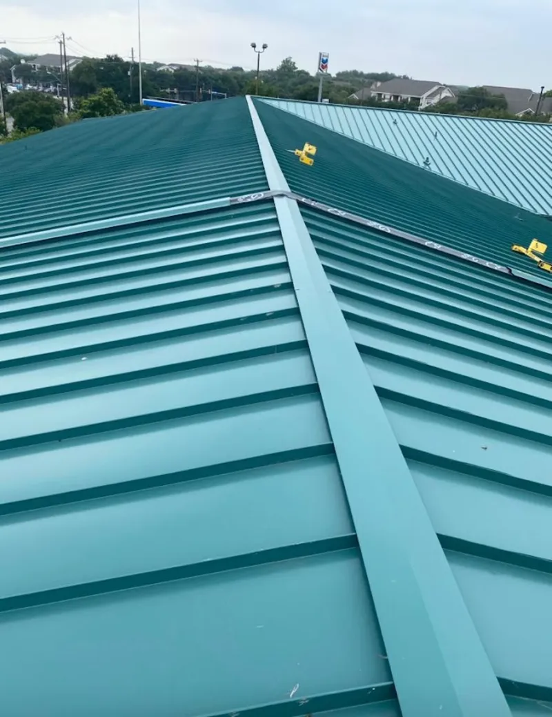 Green commercial metal roof ridge and valley for Metal Roof Repair in Lapeer