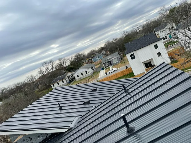 Standing seam metal roof panels with vents for Skylight Repair in Lapeer
